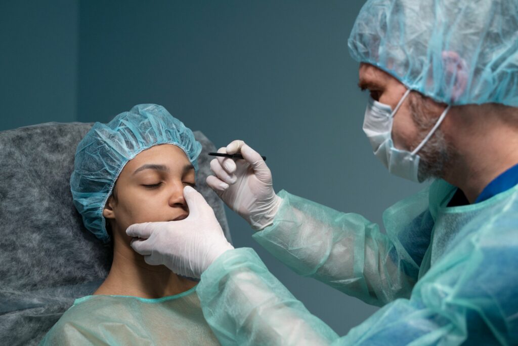 doctor-checking-patient-before-rhinoplasty-side-view